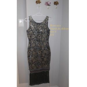 Beautiful embroidered and sequin dress with fringe